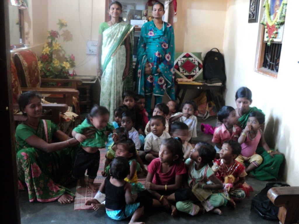 Children and women in a creche
